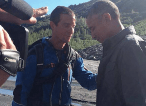 Bear Grylls praying over Barak Obama